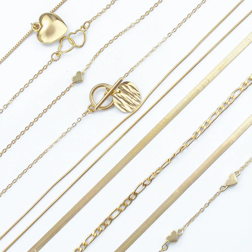 Women's gold electroplated ten-piece necklace set with snake bones chains and adjustable 21-50cm perimeter