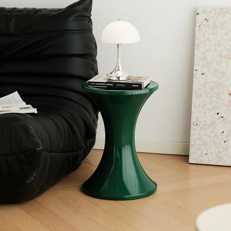 Plastic shoe changing stool with hourglass design in green colour, 40cm height