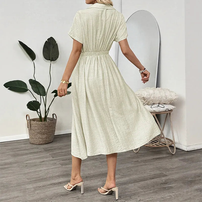 Light green twill lapel shirt dress with waist tie and splicing detail on a mannequin
