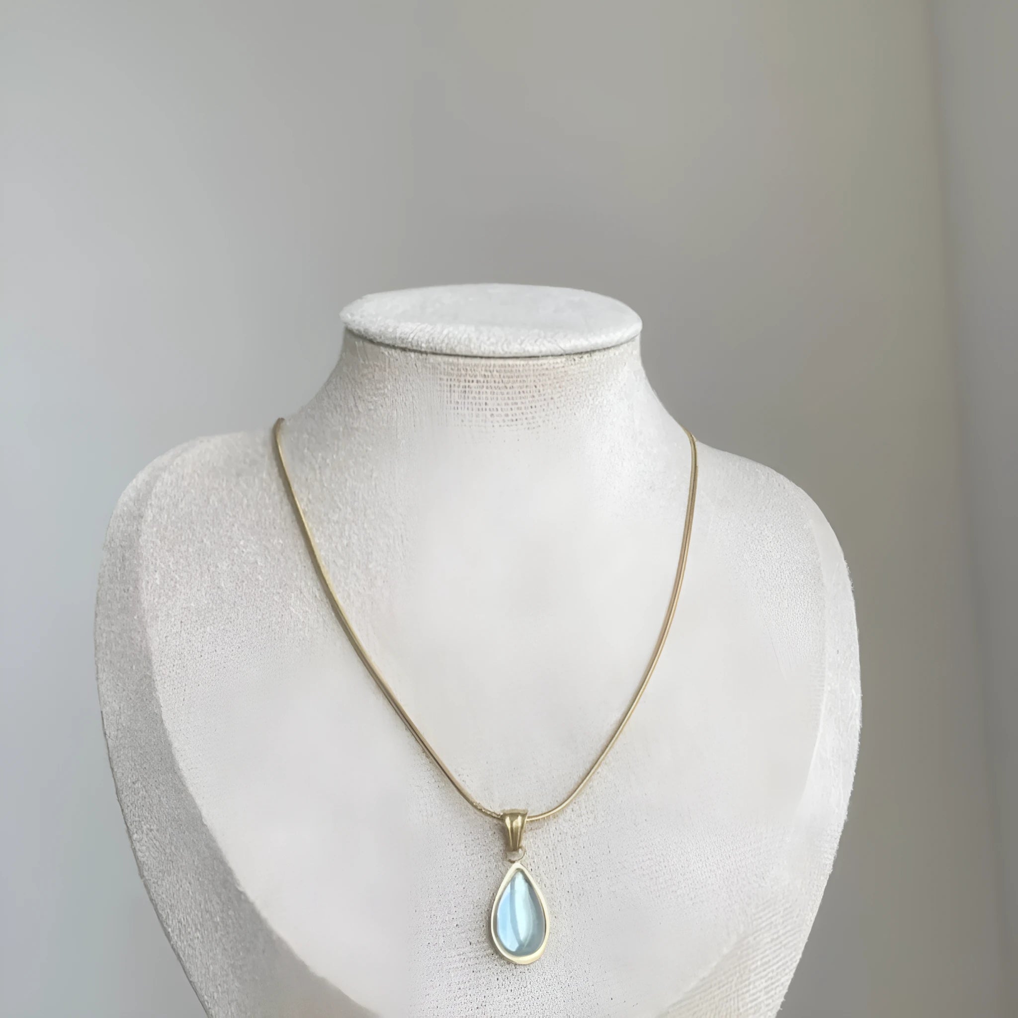 Retro water drop necklace with titanium steel chain and blue or green gemstone pendant