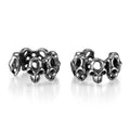 Stainless steel skull ear clips with hollow geometric design and electroplated metallic finish