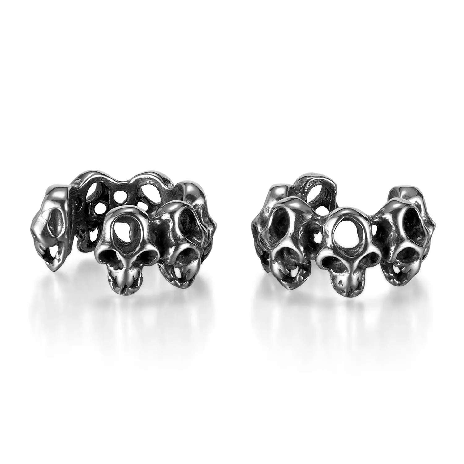 Stainless steel skull ear clips with hollow geometric design and electroplated metallic finish
