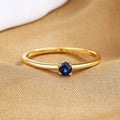 Twin style women's copper ring with a single round diamond, shown in blue, green, red, and white colour options.
