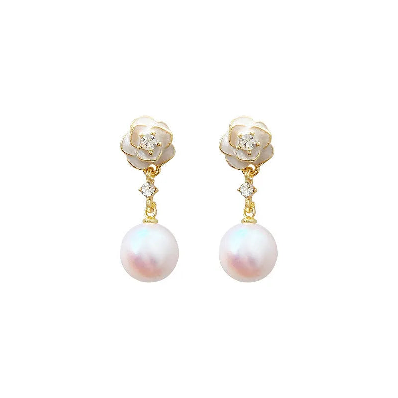A pair of camellia flower-shaped stud earrings for women in alloy.