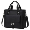 Insulated Oxford cloth picnic bag with removable shoulder strap and side pocket in black, green, or pink.