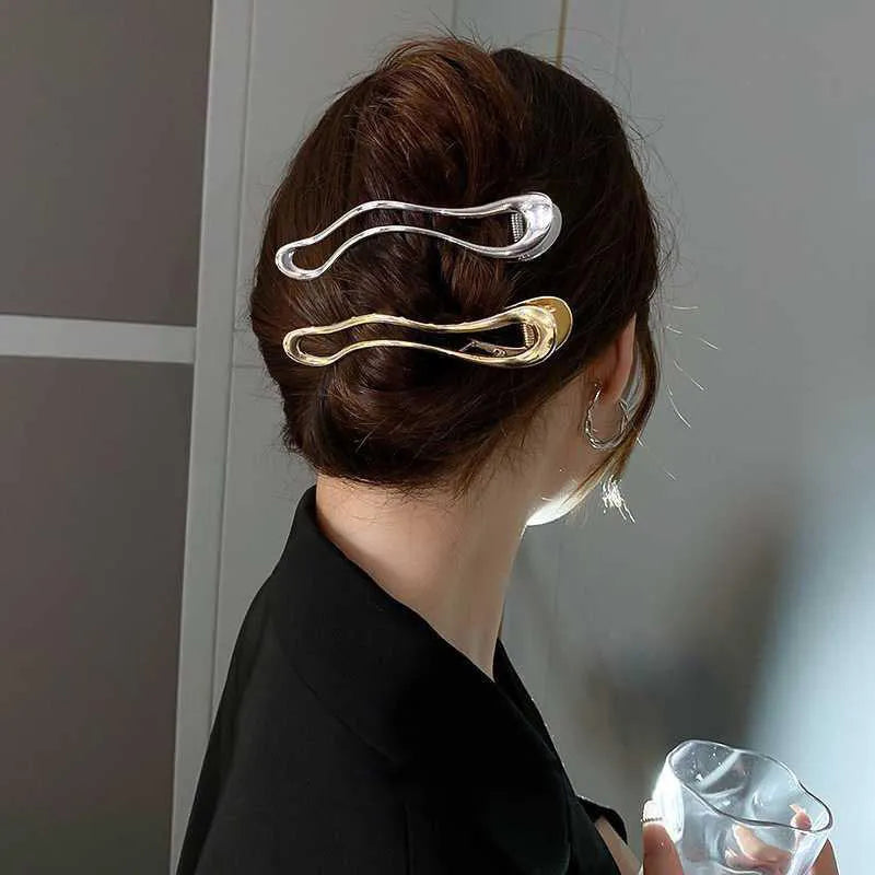 Women's geometric hair clips in polished zinc alloy, gold and silver colours, square arc triangle shapes