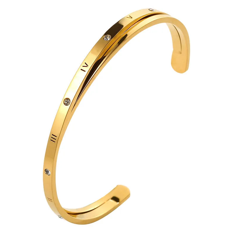 Open-ended women's bracelet with zircon stones and love heart element in rose gold finish