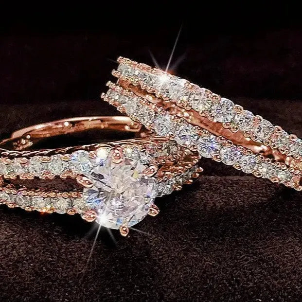 Two-piece fully jewelled female alloy ring set in geometric shapes, shown in gold, rose gold, and silver colour options.