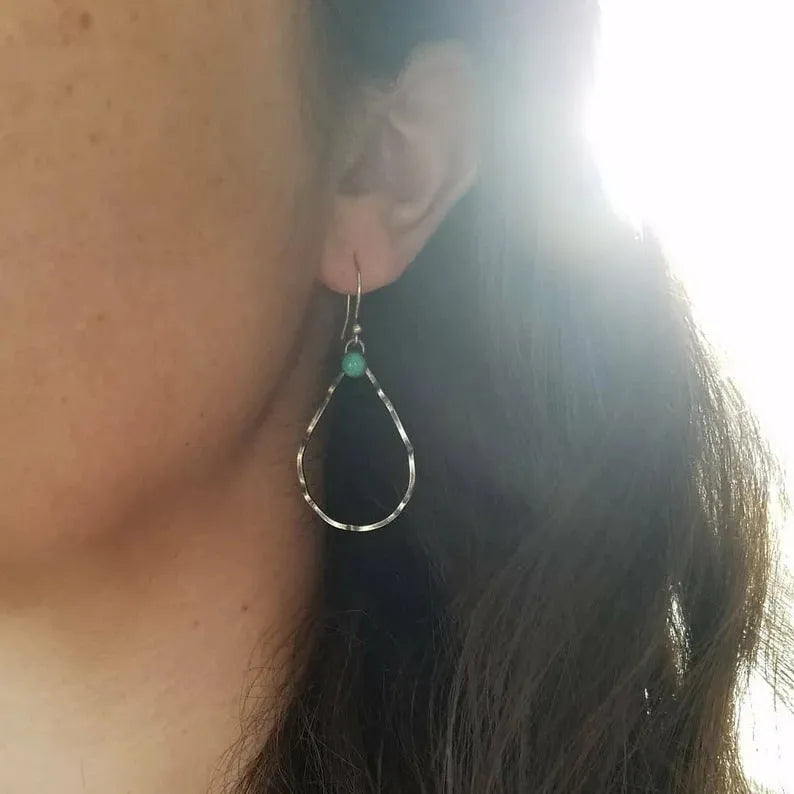 Bohemian style circle turquoise earrings in antique silver with geometric design