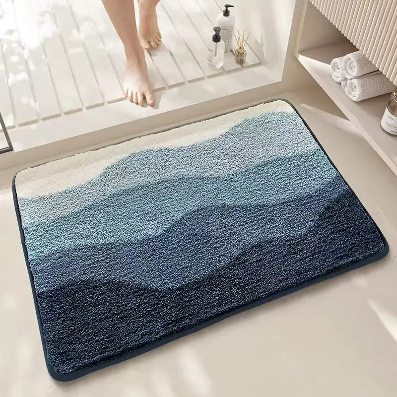 Square rainbow pattern carpet mat in sky sea colour with plastic bottom, shown in 40x60cm and 50x80cm sizes