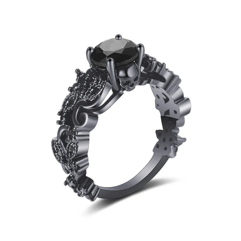 Unisex copper punk electroplated black gold ring with inlaid black zircon stone and olive branch motif on black background