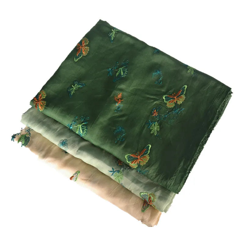 Pure ramie embroidery cloth hanfu fabric in beige, dark green, or grass green, showing texture.
