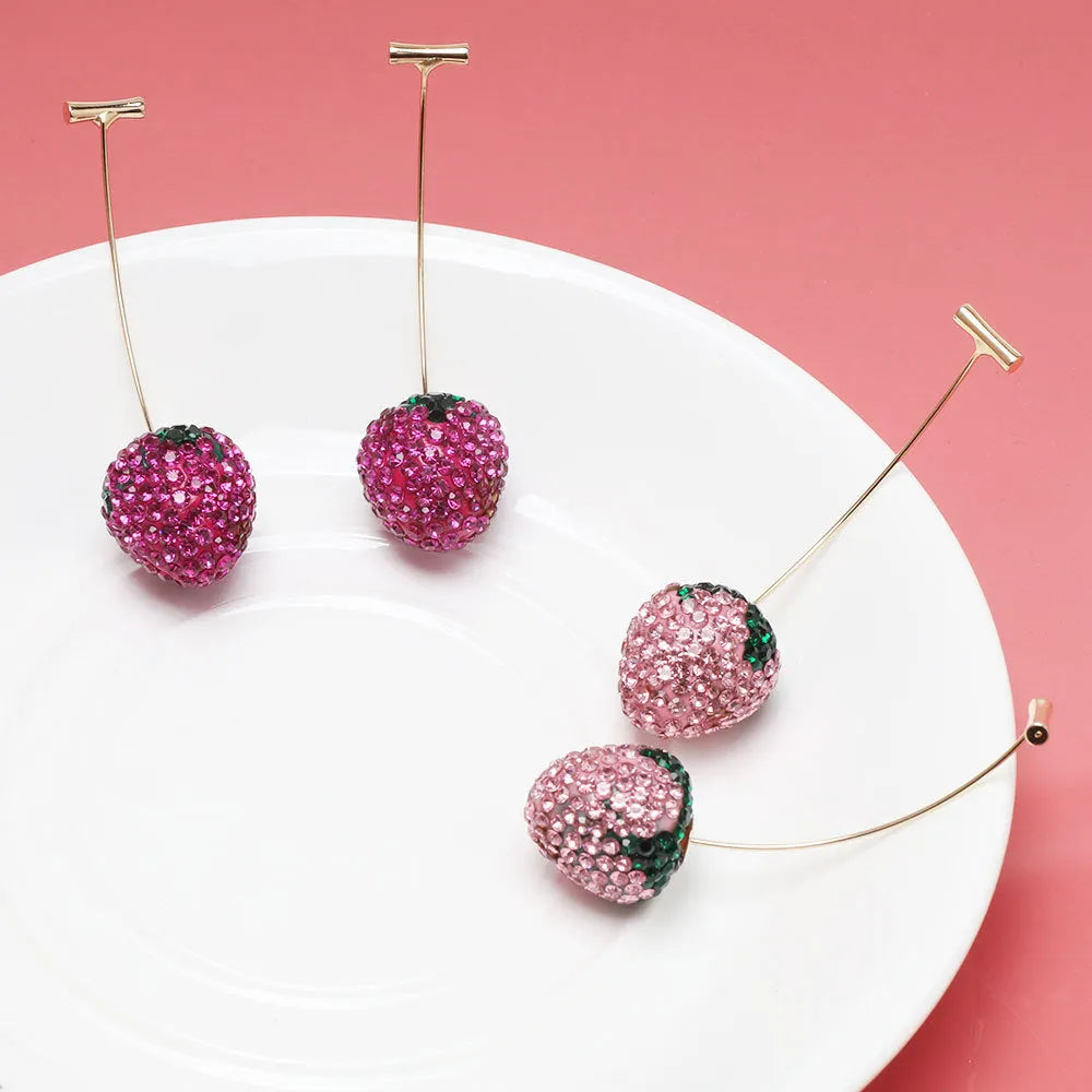 Geometric strawberry earrings with spot drill design in zinc alloy, showing colour variations