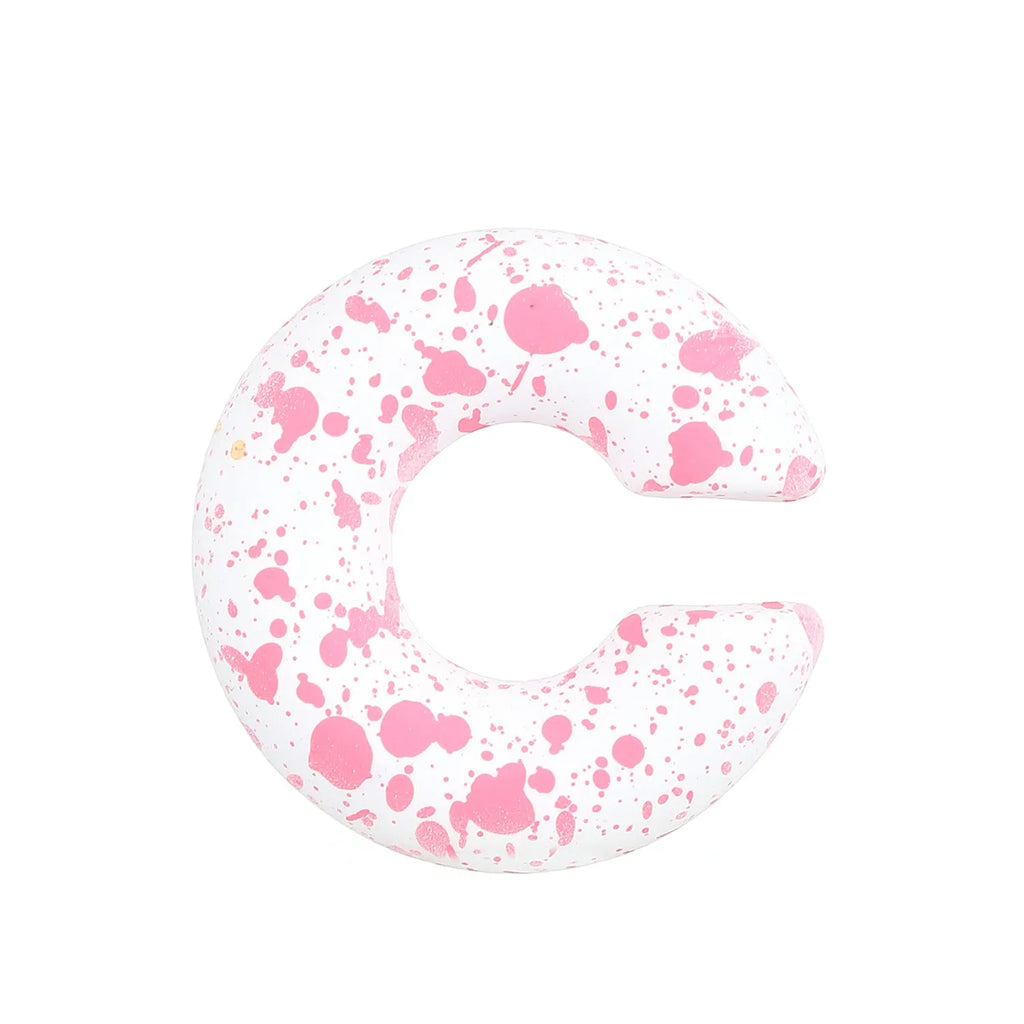 A pair of matte coarse finish round C-shaped clip-on earrings for women, shown in a candy colour.