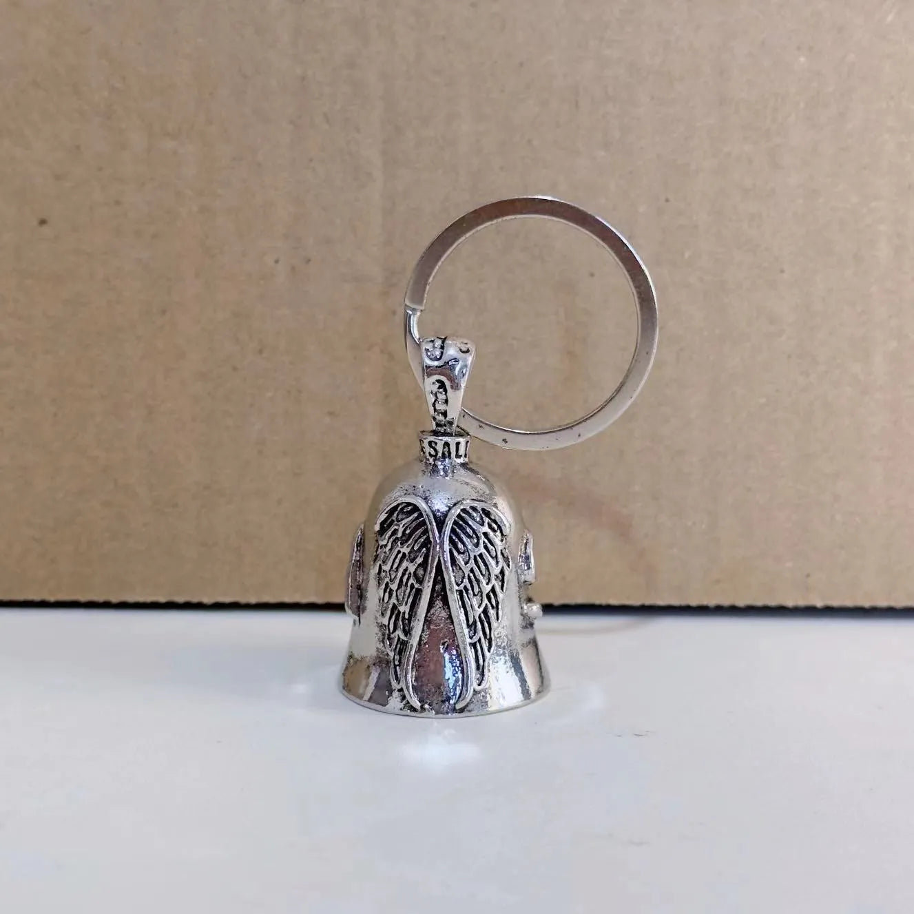 Vintage white angel feather pendant on alloy keychain and necklace.