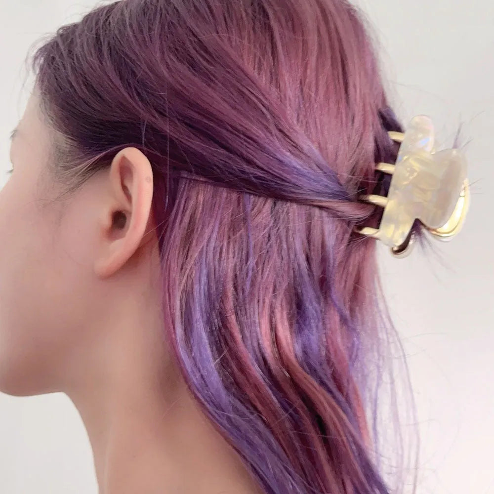 Women's retro acetate hair barrettes with metal grip in medium size showing four R08 colour options