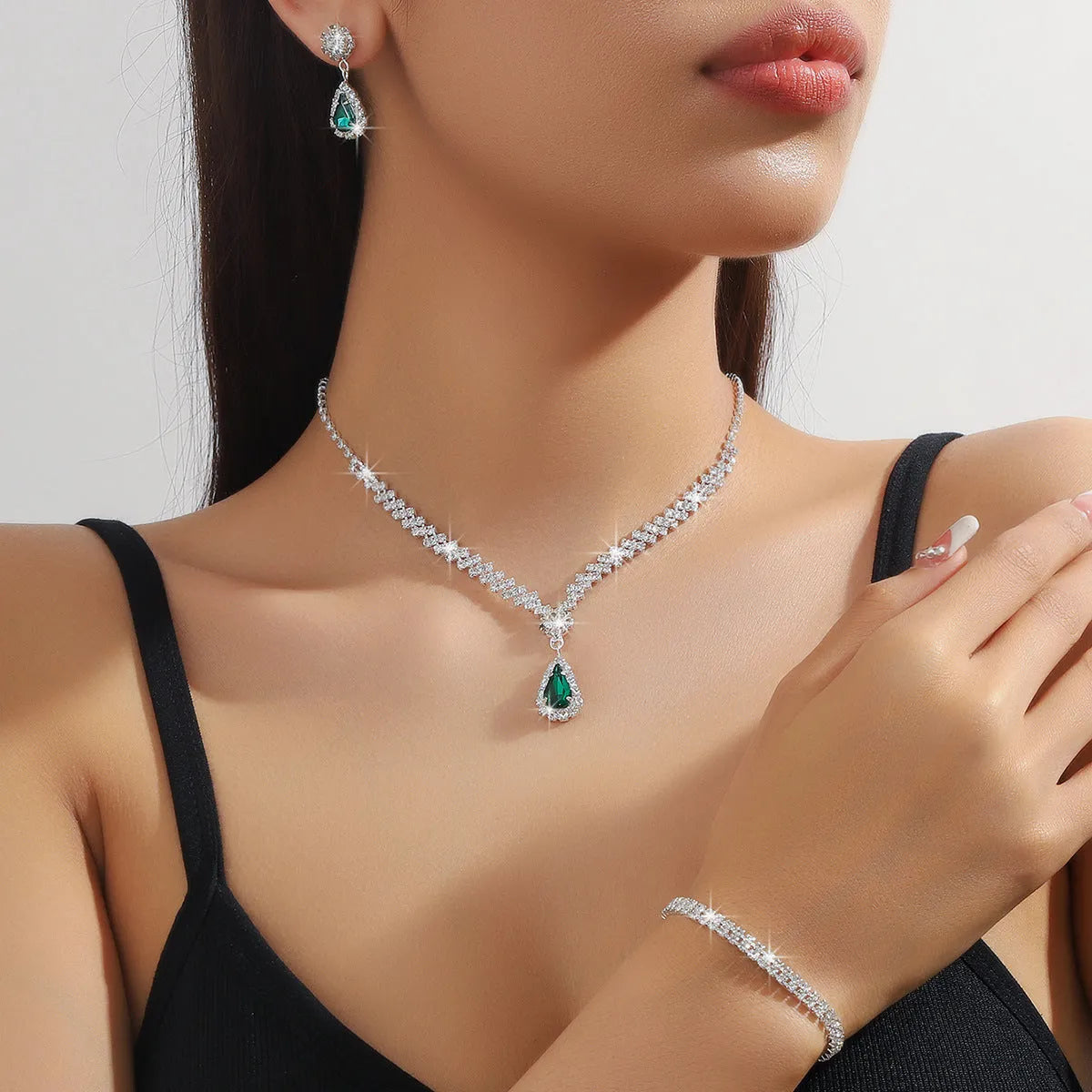 Claw chain necklace and earrings set with rhinestone water drops in multiple colour options