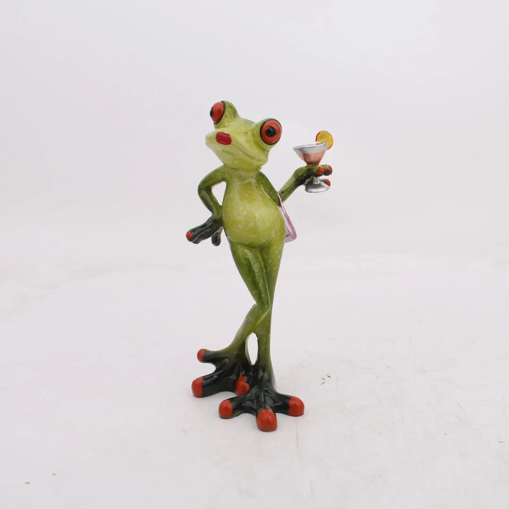 Pastoral style green resin frog decoration figurine on a wooden shelf.