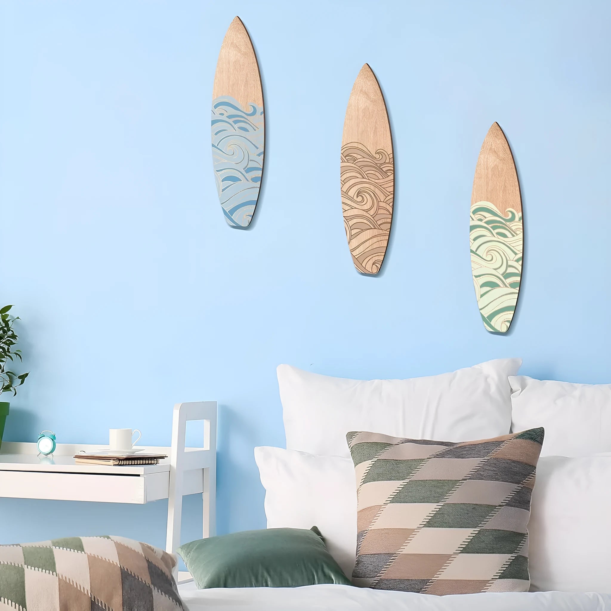 Three identical wooden surfboard decorations on display