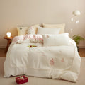 Winter milk fibre bedding four-piece set with Christmas tree pattern on quilt and pillowcases