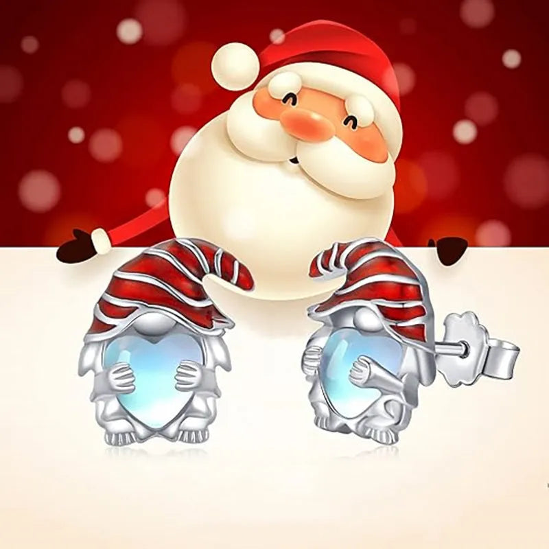Women's Santa Claus heart shaped earrings in a white gold colour on a copper base.
