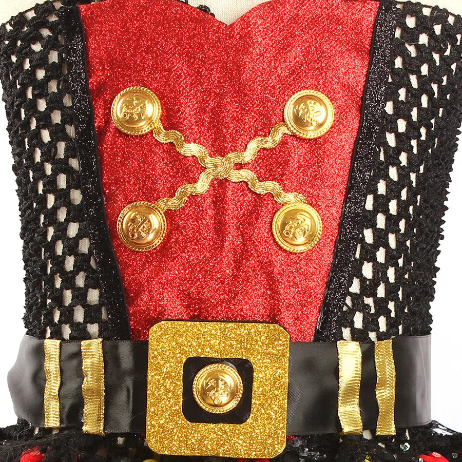 A sleeveless girls' pirate costume dress with black sequin decoration and sheer mesh panels.
