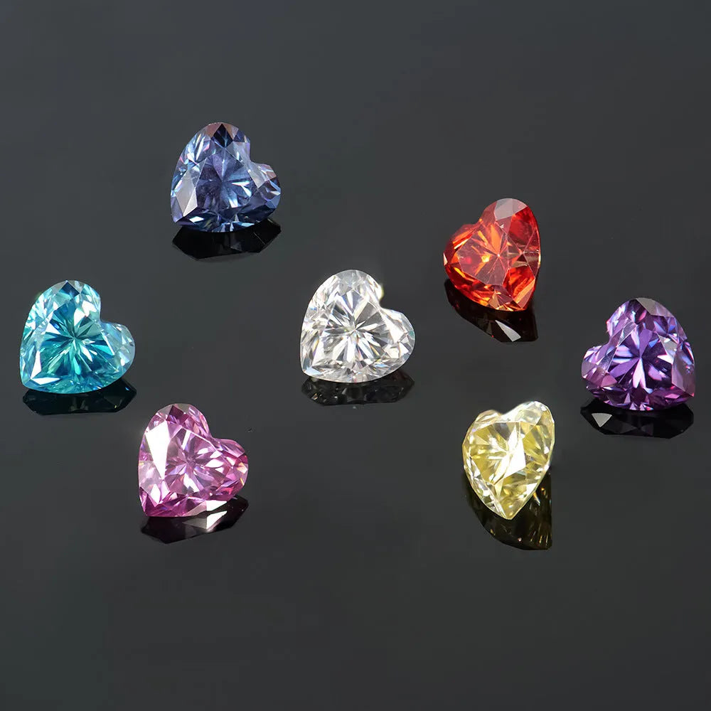 Heart-shaped moissanite gemstone in lemon yellow colour, shown alongside other colour options.