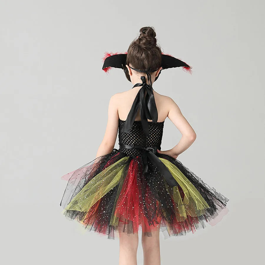 A sleeveless girls' pirate costume dress with black sequin decoration and sheer mesh panels.
