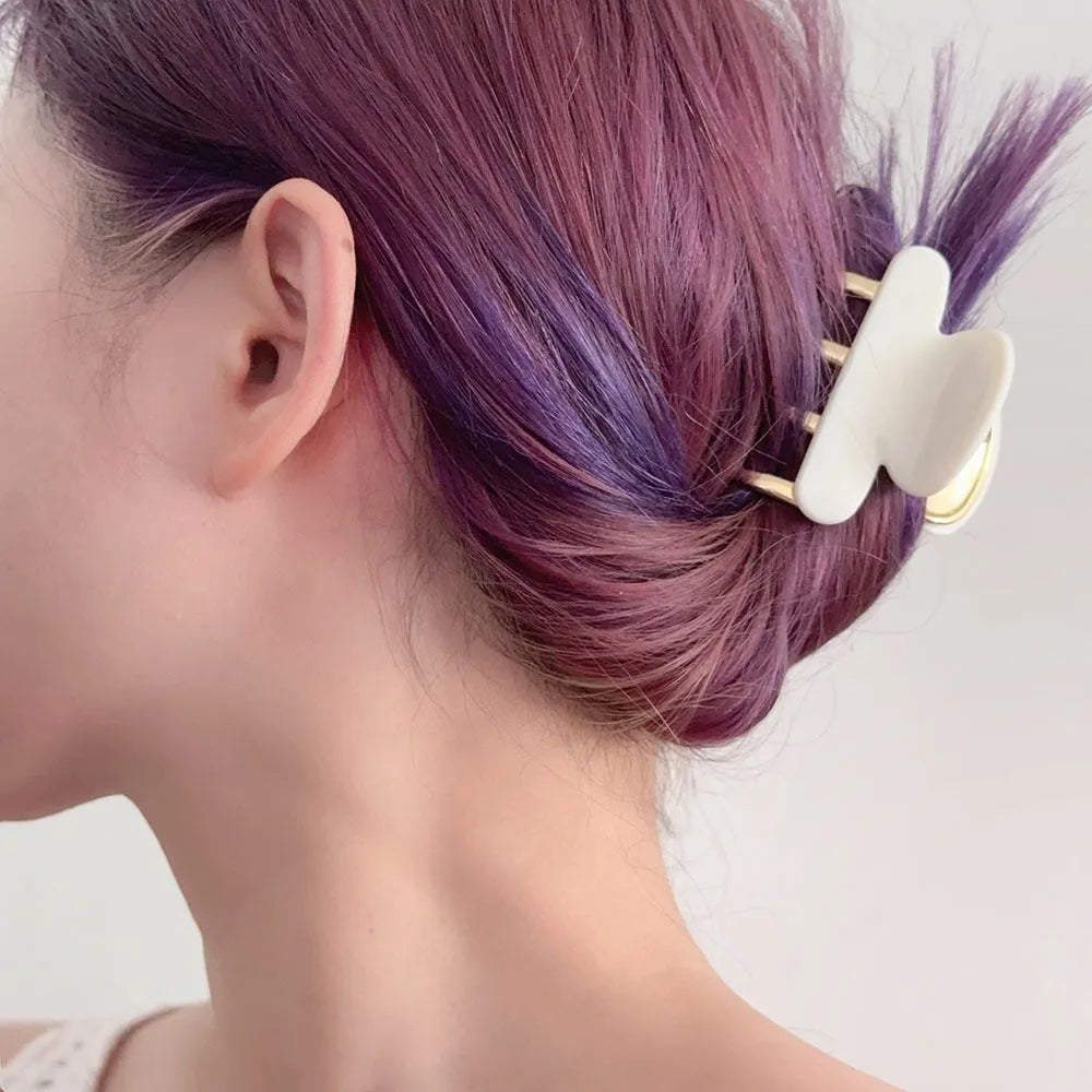 Women's retro acetate hair barrettes with metal grip in medium size showing four R08 colour options