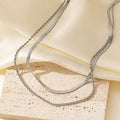 Adjustable double-layer twist necklace with titanium steel pendant and stainless steel chain