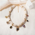 Women's bamboo design resin heart necklace with electroplated finish on adjustable chain