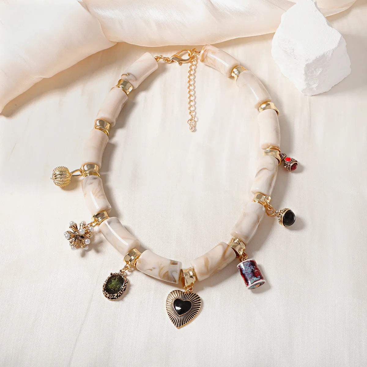 Women's bamboo design resin heart necklace with electroplated finish on adjustable chain