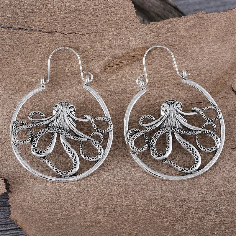 Vintage octopus earrings in antique silver colour with detailed animal zodiac design