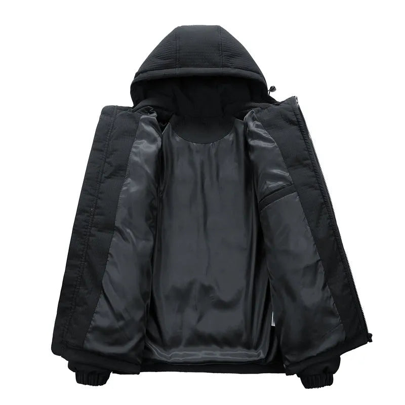 Man wearing a black hooded winter coat with letter print and side pockets, styled as a Korean cardigan.