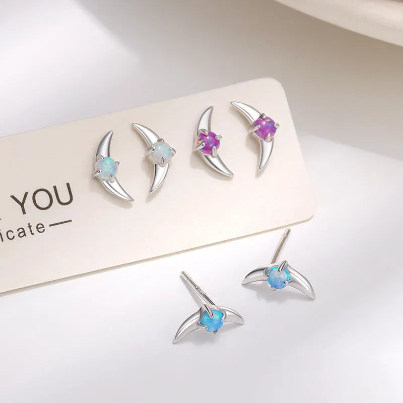 Geometric shaped 925 silver women's earrings with electroplated finish and coloured stone detail.