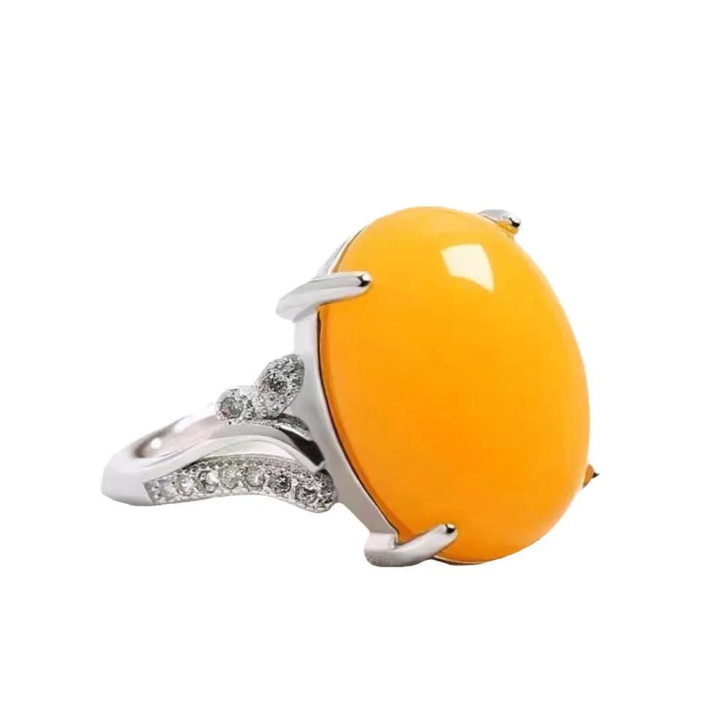 Adjustable geometric alloy ring with a natural sapphire style, shown in multiple colour options.