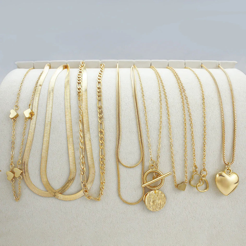 Women's gold electroplated ten-piece necklace set with snake bones chains and adjustable 21-50cm perimeter
