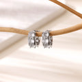 U-shaped stainless steel clip earrings with inlaid zircon stones in colour E5772P