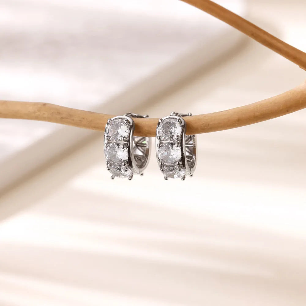 U-shaped stainless steel clip earrings with inlaid zircon stones in colour E5772P