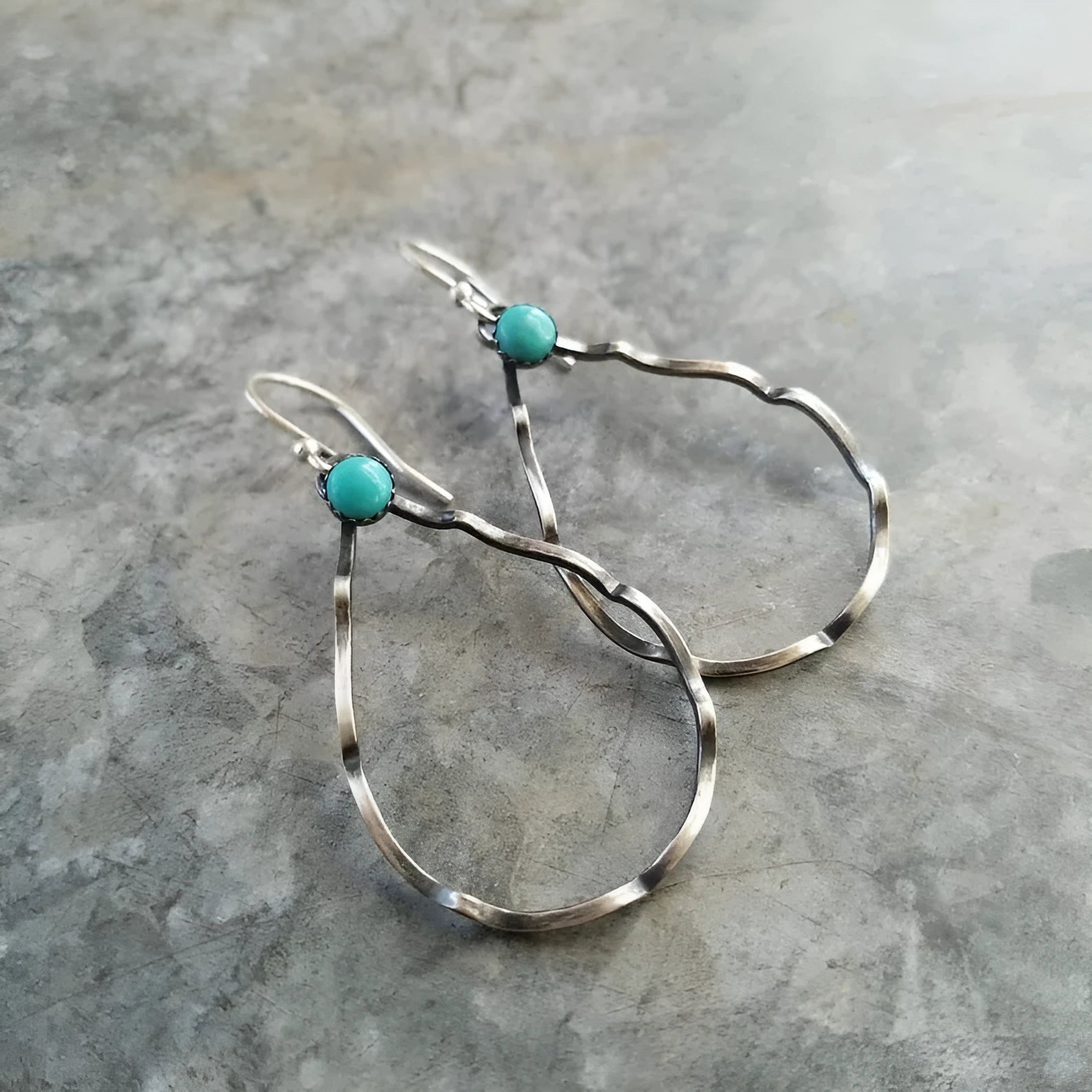Bohemian style circle turquoise earrings in antique silver with geometric design