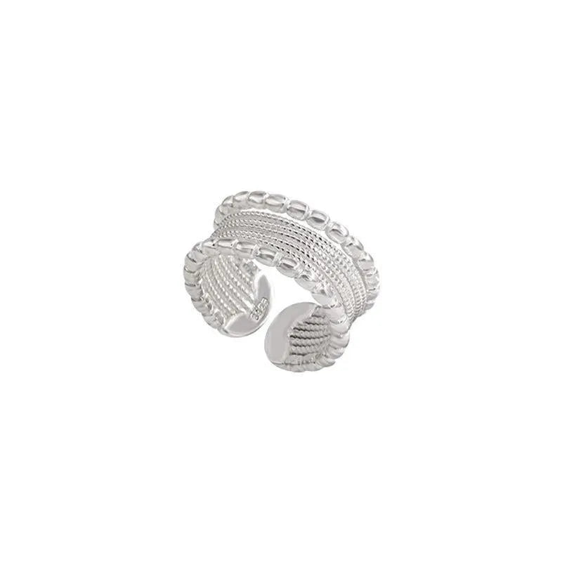 Women's adjustable geometric copper ring with woven twisted multilayer design