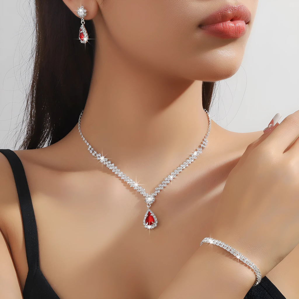 Claw chain necklace and earrings set with rhinestone water drops in multiple colour options