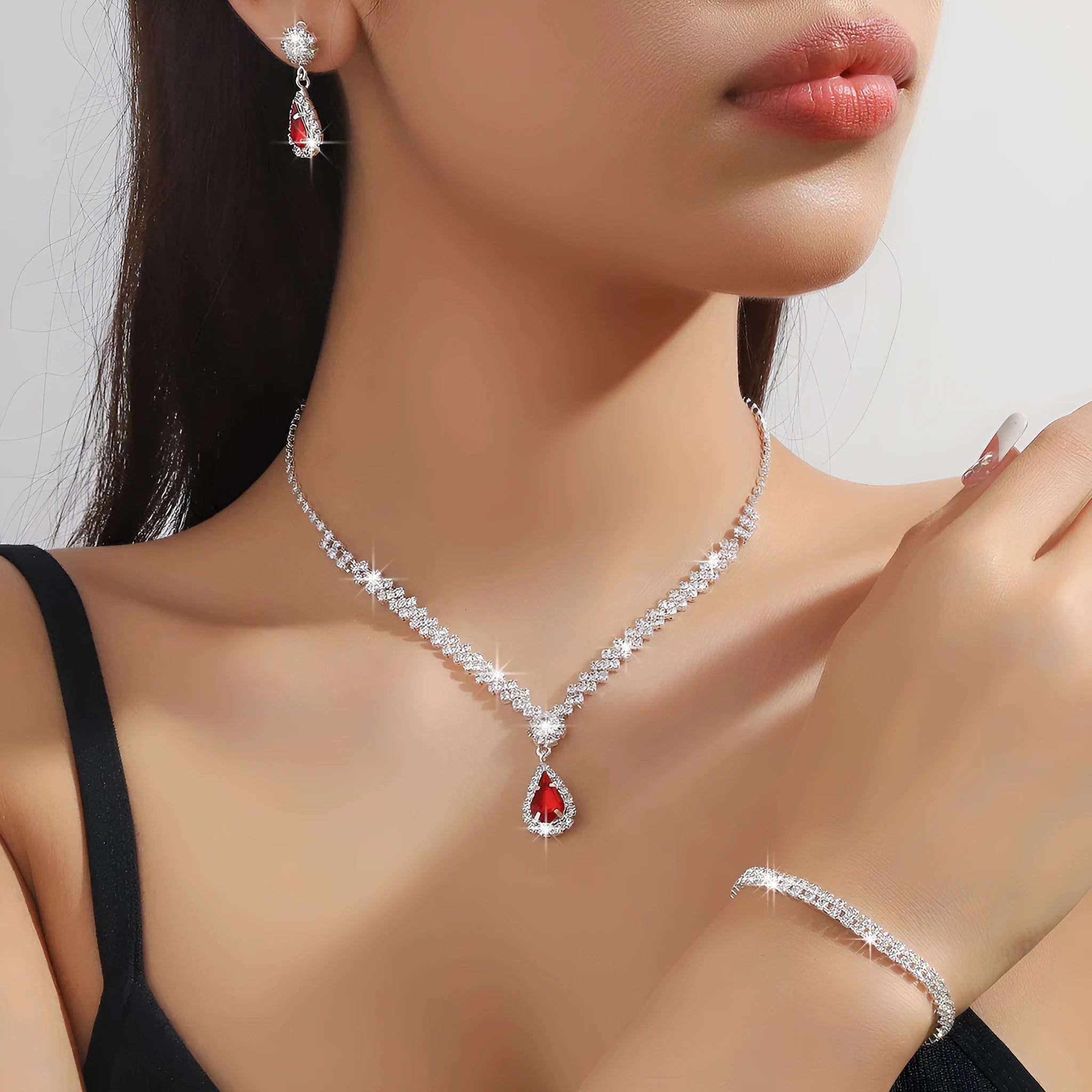 Claw chain necklace and earrings set with rhinestone water drops in multiple colour options