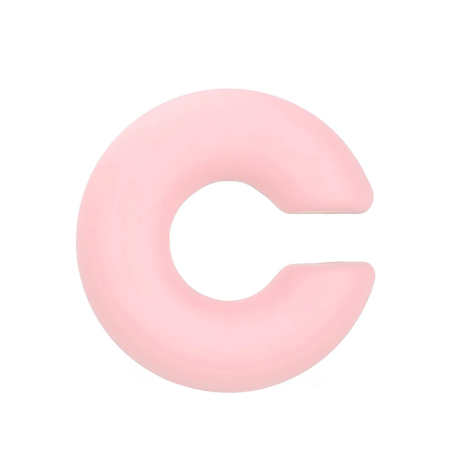 A pair of matte coarse finish round C-shaped clip-on earrings for women, shown in a candy colour.