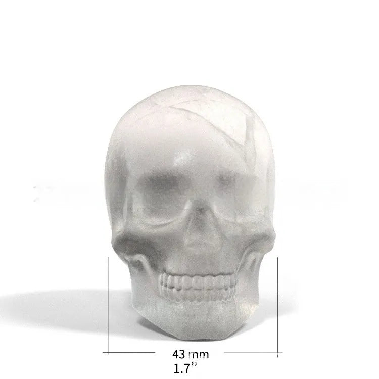 3D silicone Halloween skull ice cube tray showing detailed mould cavities.