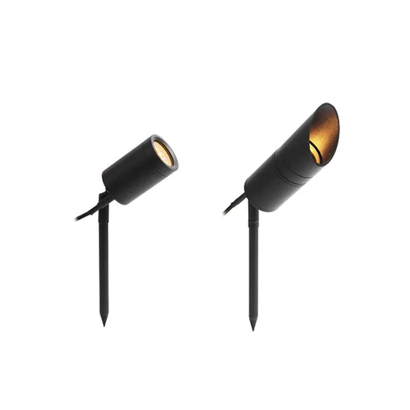 Outdoor aluminium ground lamp with COB LED for garden lighting on grass.