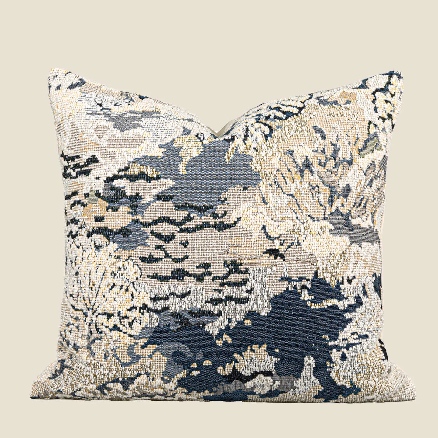 Antique blue cushion with embroidered floral pattern in Chinese style on a sofa