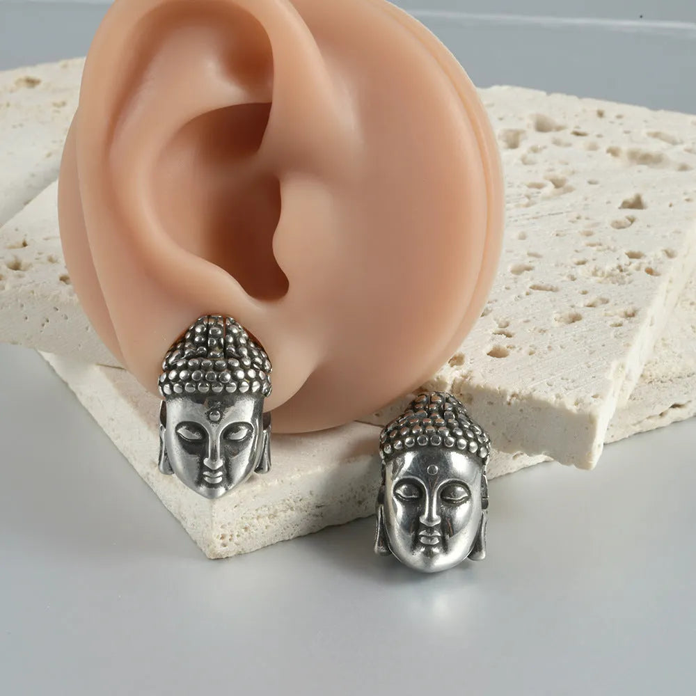 Stainless steel hollow geometric skull and Buddha head earrings with electroplated finish