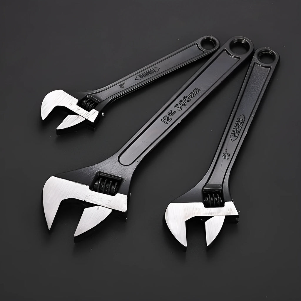 High carbon steel adjustable open-end wrench with blackened finish on a grey background.