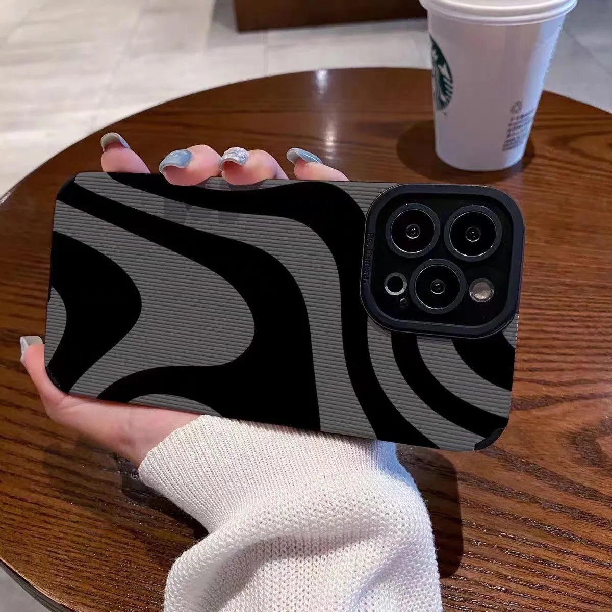 Dark zebra pattern silicone phone case with black imitation leather finish and shockproof protection for iPhone models